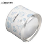 Metal can with paper wrap